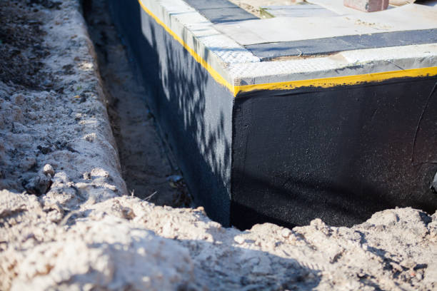 Professional Waterproofing technician working in Jonesville, NC